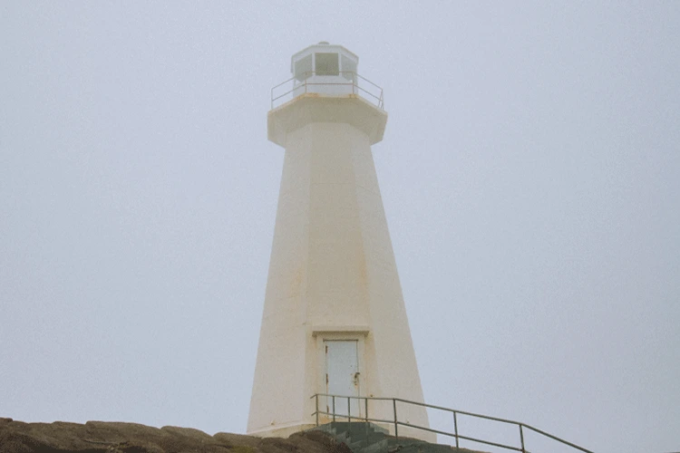 Lighthouse in Newfoundland photo by With Care Media