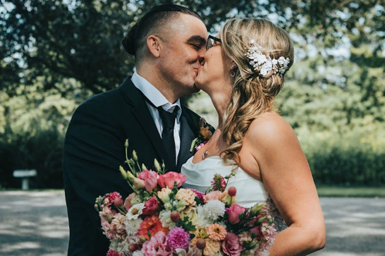 Bride and groom on their wedding day smiling